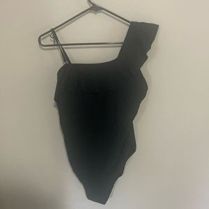 One piece swimsuit in black. Size medium.